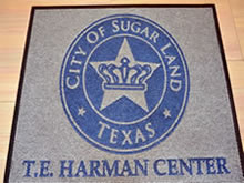 Custom Made Logo Mat Purchased On GSA Contract - Custom Made Logo Mat Purchased On GSA Contract - City Of Sugarland Texas Municipal Building