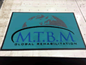 Custom Made ToughTop Logo Mat MTBM Global Rehabilitation of Conyers Georgia