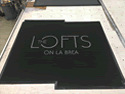 Custom Made ToughTop Logo Mat Residential Building Lofts On La Brea of Los Angeles California