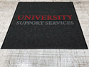 Custom Made ToughTop Logo Mat University Support Services of Great River New York